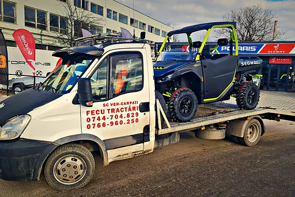Autospecială FECU Tractări Auto cu ATV pe platformă